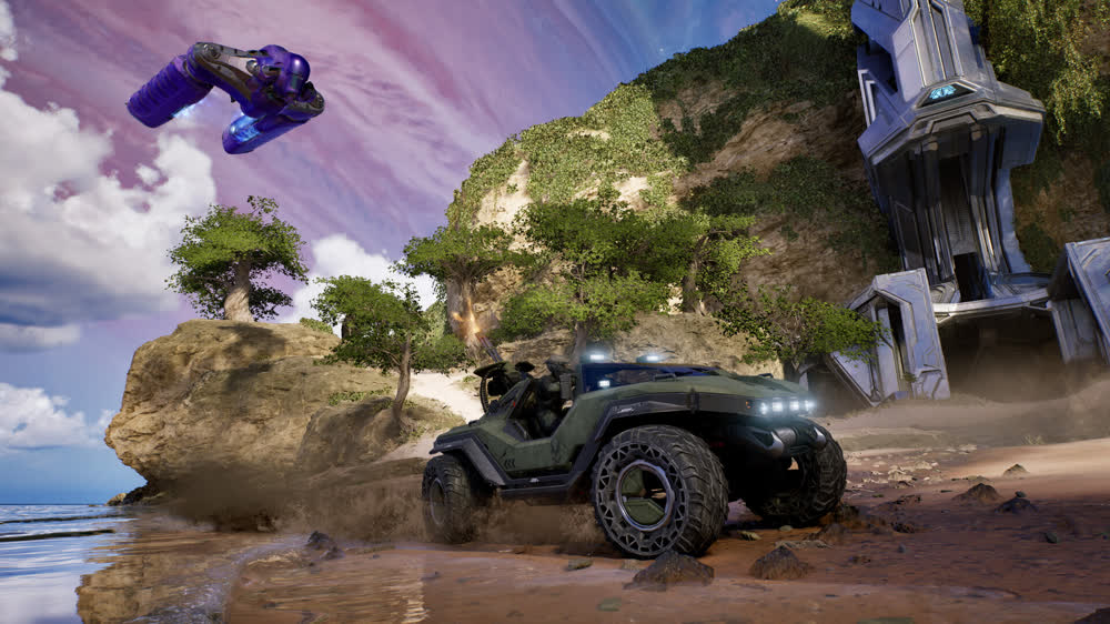Master Chief against the Halo ring — official Halo: Campaign Evolved artwork