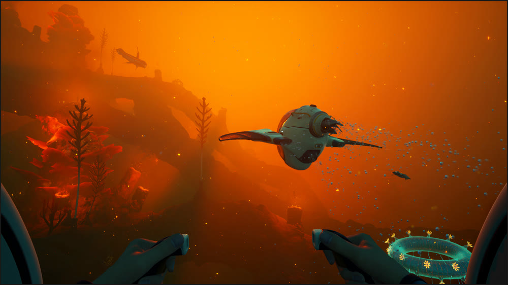 Two divers lit by a flashlight above the reefs of Proteus — official Subnautica 2 artwork
