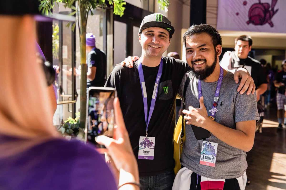 TwitchCon crowd lit purple, watching the stage — official Twitch photography